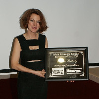 Maria Butterly receiving the award for Best Original Single at the Farmers Journal Awards